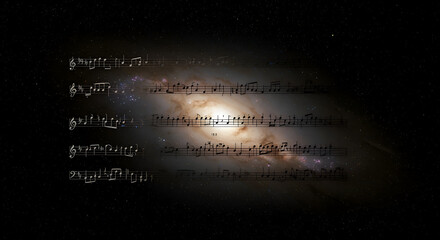 Musical notes superimposed on a galaxy.