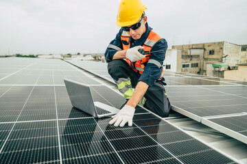 Technician working on solar panels on a rooftop in an urban setting during overcast weather