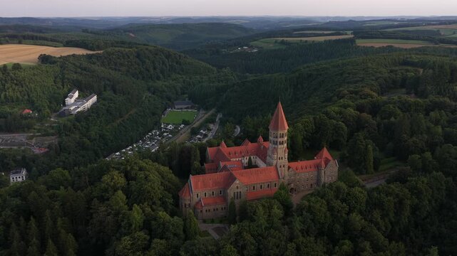 Abbey of Clervaux Abbey of St. Maurice and St. Maur in Luxembourg, Benedictine religious tradition, Neo Romanesque architecture, history, monastic life.