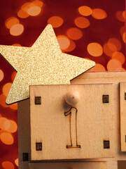 First December wooden drawe number one with golden star