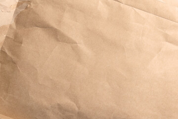 Old recycled brown wrapping paper texture. Abstract aged background
