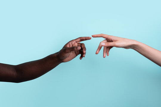 Connection between diverse hands on blue background