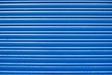Blue corrugated metal door texture background
