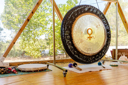 Gong in a peaceful sound therapy setting