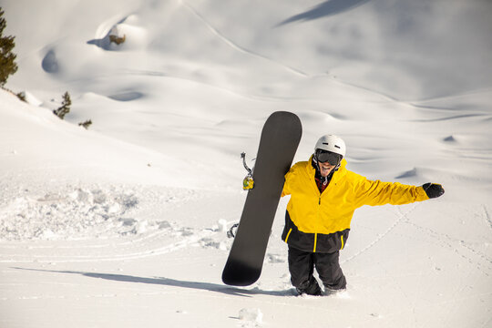 Snowboarder enjoying backcountry powder adventure