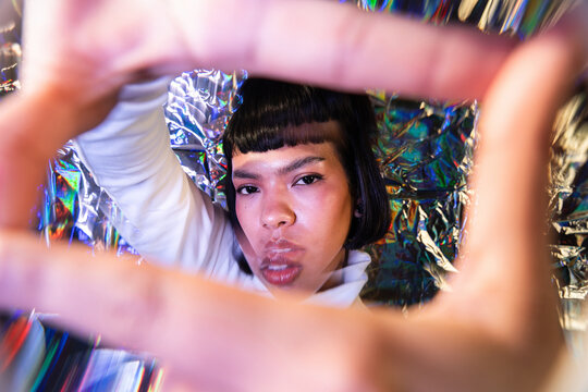 Futuristic woman exploring the metaverse in style