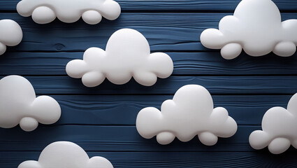 Whimsical cartoon clouds on a dark blue wood background with soft light