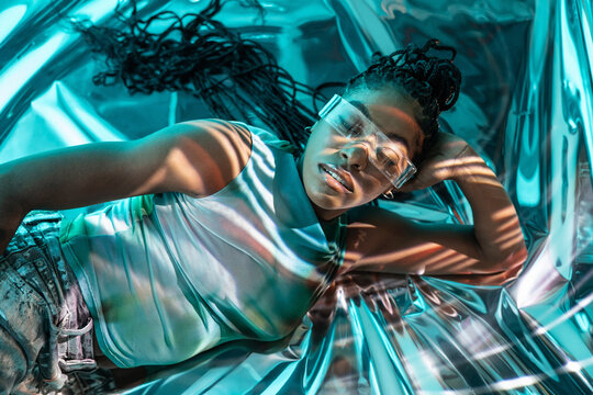 Futuristic young woman immersed in the metaverse