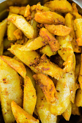 fried potato wedges with garlic