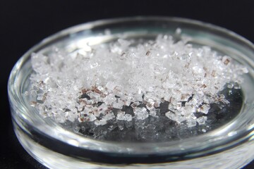 Close up of a Sparkling Crystalline Substance in a Glass Container