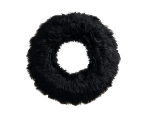 PNG Of A plush black faux fur wreath, soft and inviting, perfect for cozy home decor.