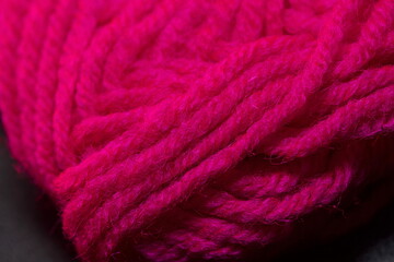 Pink wool thread closeup. Selective focus. Wool. Thread.