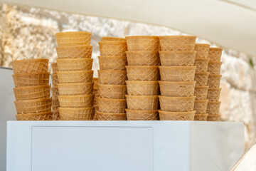 Ice cream cones at a stand on a warm summer day