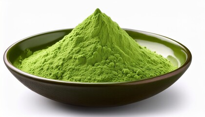 a bowl of green powder is sitting on a white background