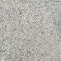 River sand texture background with fine natural grains and small pebbles