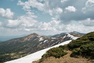 Snow-capped peaks and lush greenery in Svydovets mountain range, western Ukraine