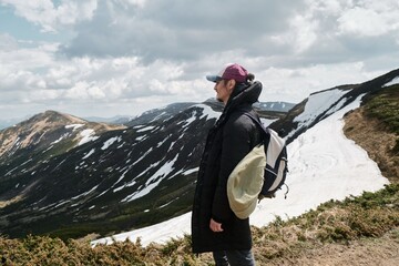 Hiker with Paraglider in Mountainous Landscape, Carpathians