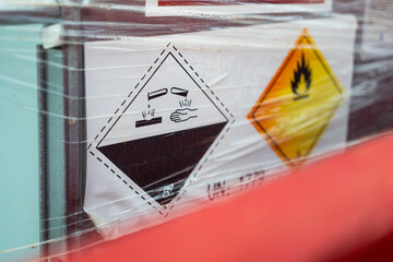 Acidity corrosion or skin burn hazard, safety sign on the chemical containment barrel. Sign and...