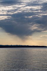 dark clouds pushing away the sunny weather, over Lake Constance seen from Höchst Vorarlberg