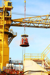 Crews boat moving the passenger and cargo from the platform to supply boat in oil and gas industry. Support offshore oil and gas industry by boat and service team.