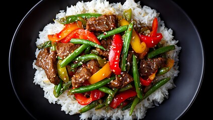 Delicious Chicken and Vegetable Stir-fry Over Rice, Close-up of a vibrant, flavorful chicken and vegetable stir-fry dish served over a bed of white rice in a dark bowl.