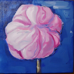 Picture of pink cotton candy on blue background with copy space