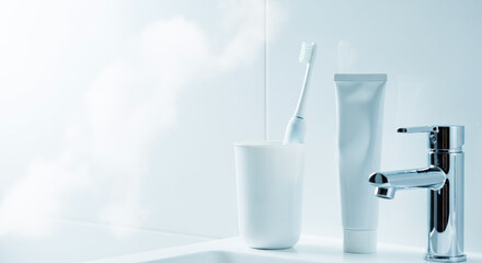 Electric Toothbrush and Toothpaste on Clean Bathroom Counter, modern dentistry website header background or wallpaper