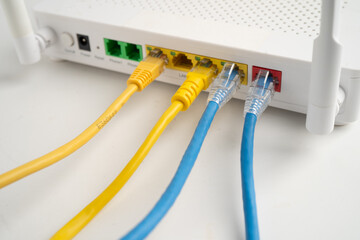 Ethernet cable with wireless router connect to internet service provider network.