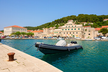 Boat moored in Pucisca bay on the island of Brac in Croatia