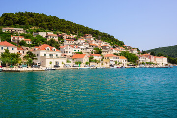 Traditional Croatian houses with red roofs in the town of Pucisca on the island of Brac. Croatia