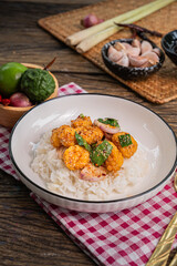 The  Spicy Crispy Chicken Salad with Rice for Thai food and cooking concept   