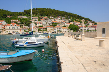 Boats moored in Pucisca bay on the island of Brac in Croatia