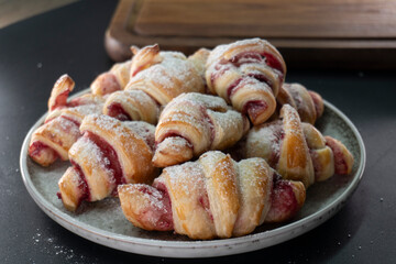 Croissants with raspberry jam. Dessert. Food concept