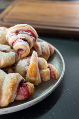 Croissants with raspberry jam. Dessert. Food concept