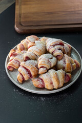 Croissants with raspberry jam. Dessert. Food concept