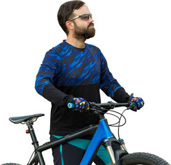 Cyclist in pants and fleece jacket on a modern carbon hardtail bike with an air suspension fork....
