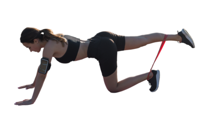 A sporty slim girl in leggings and a top resting between exercises.