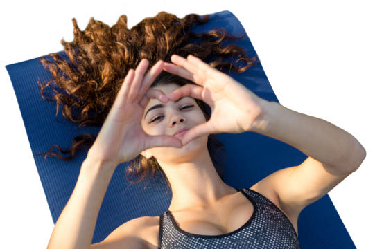 A young slim athletic girl in sportswear with snakeskin prints performs a set of exercises. Fitness and healthy lifestyle.