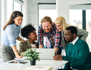 Group of young business people using laptop having a meeting or presentation and seminar in the...