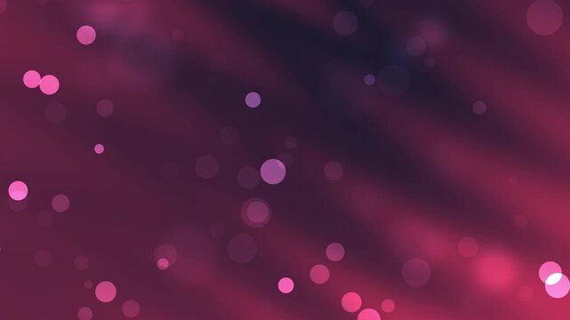 Pink bokeh lights on maroon blurred background, suitable for festive designs, invitations, greeting cards, and holiday themed projects with a colorful touch.
