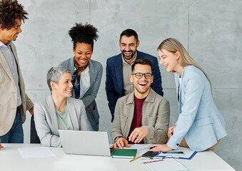 Group of young business people using laptop having a meeting or presentation and seminar in the...