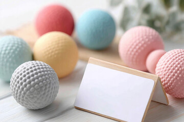 Colorful baby rattles with due date calendar for nursery decoration and infant playtime