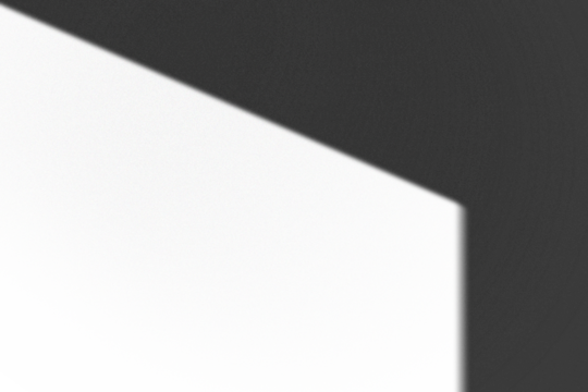 Abstract shadow pattern on white surface