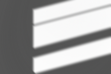 Abstract shadows from blinds on dark background