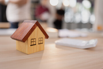 Real estate agents agree to buy a home.