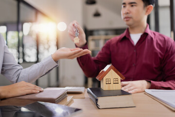Real estate agents agree to buy a home, Agreement and customer discussing for contract concept.