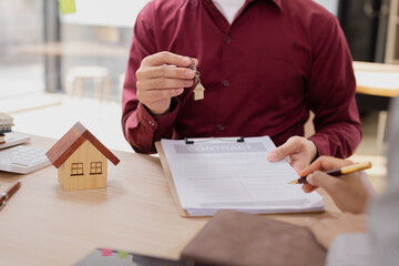 Real estate agents agree to buy a home, Agreement and customer discussing for contract concept.