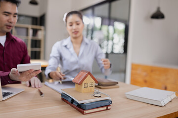 Real estate agents agree to buy a home, Agreement and customer discussing for contract concept.