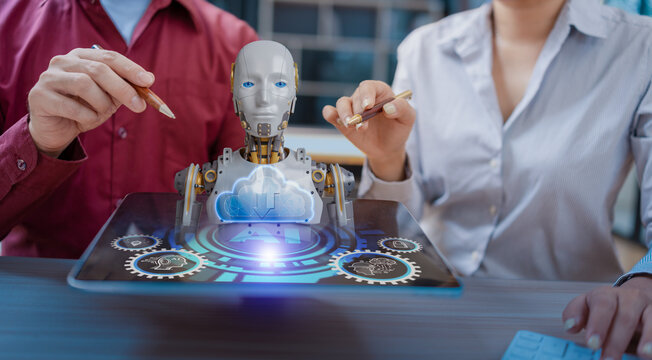 Businessman and woman holding digital tablet with futuristic interface for analytics data dashboard. - Powered by Adobe