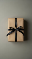 Elegant Gift Box with Black Ribbon on Neutral Background, Overhead View